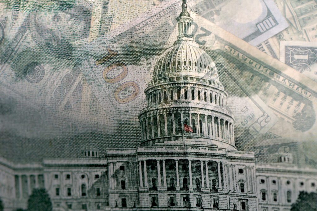 capitol building with money and cash an american flag