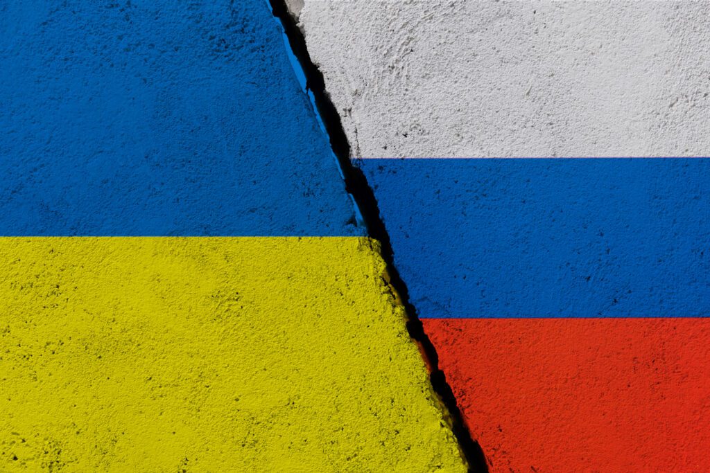 Risk Management Russian and Ukrainian flags on broken