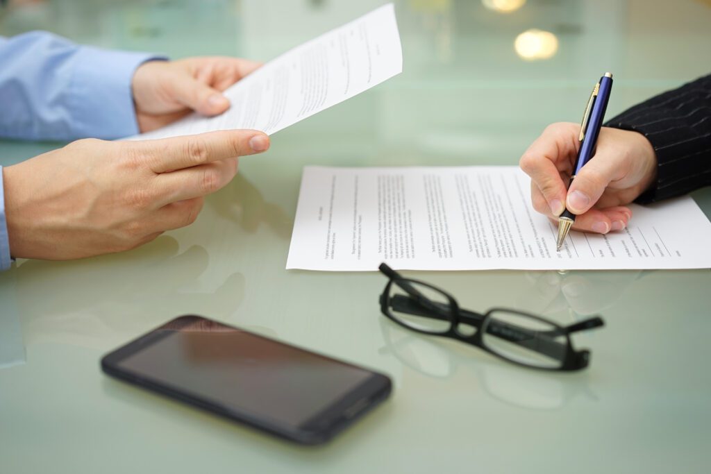 insurance options discussed at a table with business people