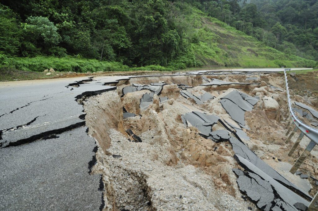 Asphalt Cracked Road Collapsed by earthquake