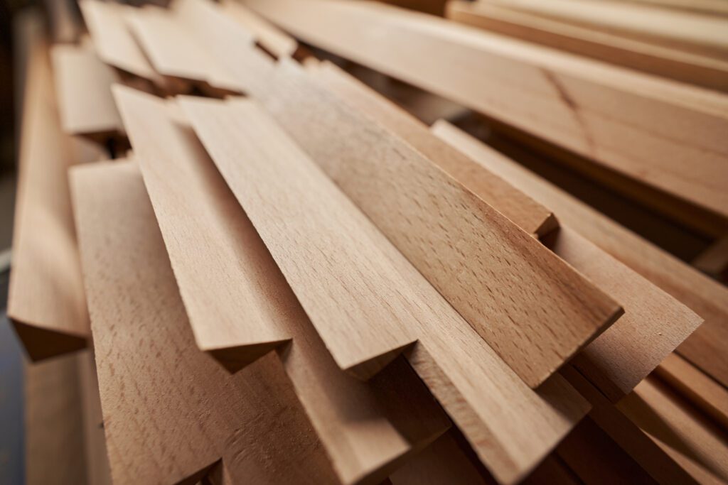 Focused photo on wooden planks being at workshop Focused photo on wooden planks being at workshop